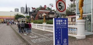 SPECIAL LANE FOR CELLPHONE ADDICTS china mobile phone sidewalk story top