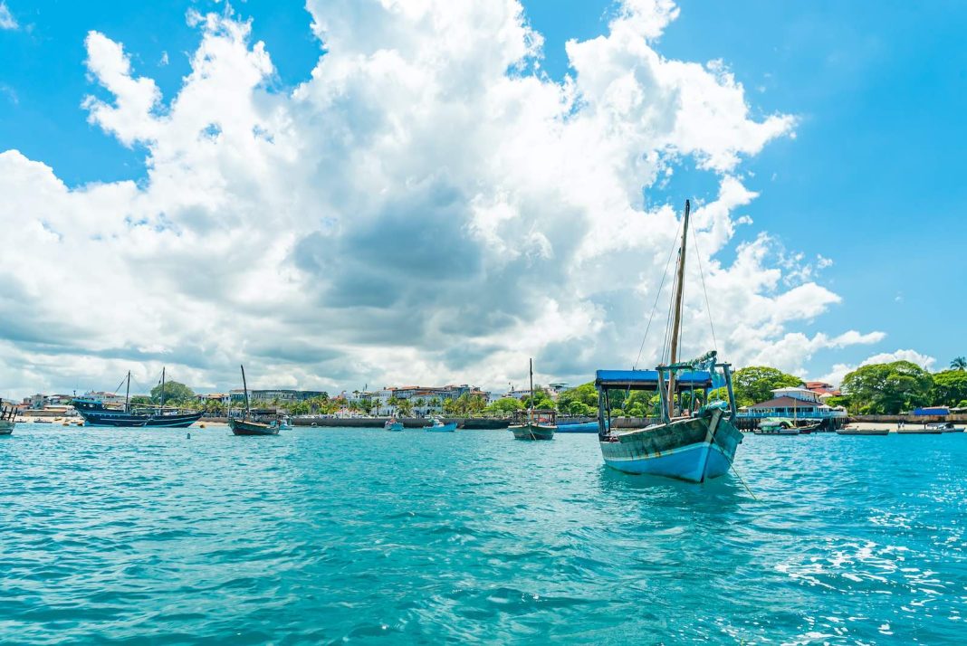 STONE TOWN, ZANZIBAR - DECEMBER 22, 2021: Boats in a port of Stone Town, Zanzibar, Tanzania Zanzibar